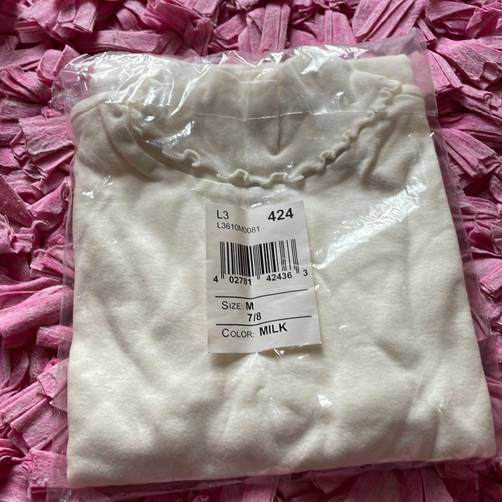 Brand new turtle neck long sleeve shirt size M(7-8)